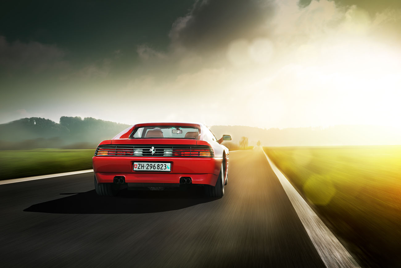 Fahrtaufnahme des Ferrari 348ts. Fotografie und Bildbearbeitung von phPics.ch