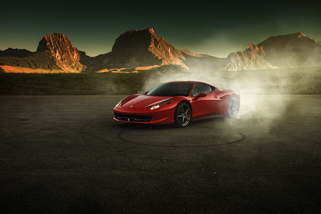 Burnout eines roten Ferrari 458 Italia im Berner Oberland. Auto Fotografie von phPics.ch