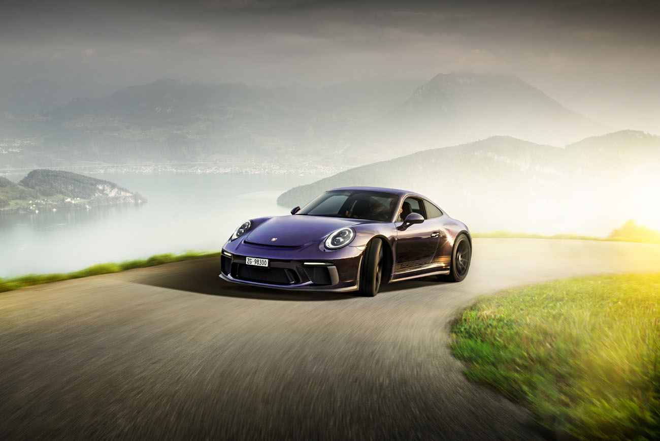 Dynamischer Porsche. Der Porsche 911 GT3 Touring fährt in der Vierwaldstättersee-Region.
