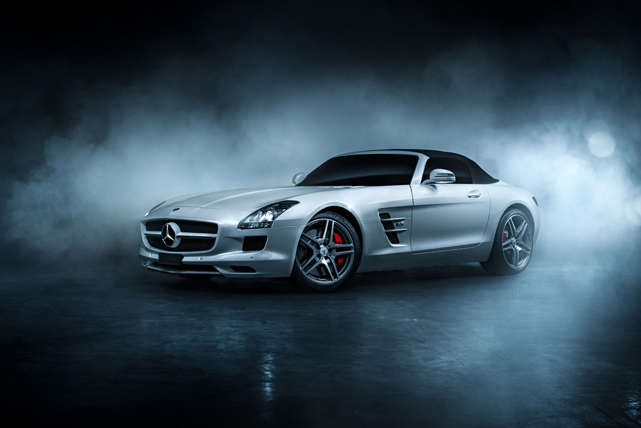 Auto Bilder von phPics. Der Mercedes SLS AMG Roadster in weiss.