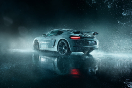 Porsche Cayman Marmor Wassershooting